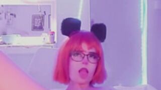 Girl in wig and glasses masturbates