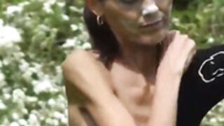anorexic Denisa in field