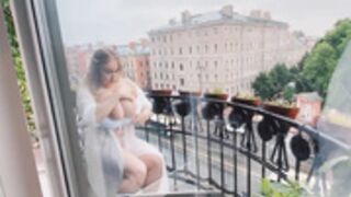 Busty White Girl Flashing On Balcony