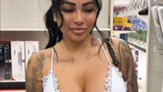 Brittanya Razavi riding dildo in chair at store