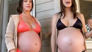 Pregnant Sisters in Revealing Bikinis with Full Bellies