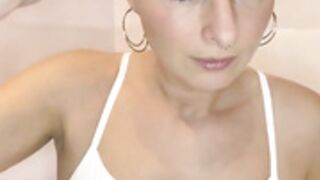 sexy lady shaves smooth bald