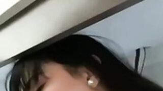 Green Eyed Beauty sucking under the table