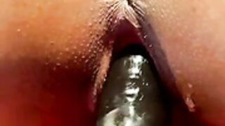 Suzy Cortez plays with a dildo