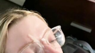 Blonde slut in glasses gets a facial
