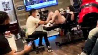 Busty latina squirts while getting pussy tattoo done
