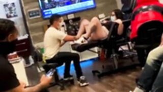 Busty latina squirts while getting pussy tattoo done