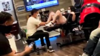 Busty latina squirts while getting pussy tattoo done