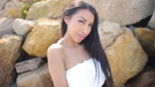 Liza Jane gets naked on a nudist beach OF 1