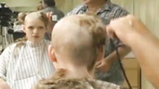 two beautiful ladies shaved smooth bald