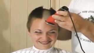 two beautiful ladies shaved smooth bald