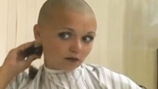 two beautiful ladies shaved smooth bald