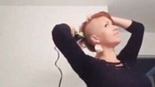beautiful redhead shaves smooth bald