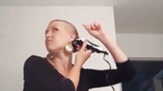 beautiful redhead shaves smooth bald