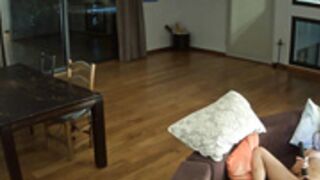 Elettra watches porn movies and rubs her pussy