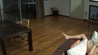 Elettra watches porn movies and rubs her pussy