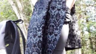 Nerdy girl nipple clamps buttplug in nature