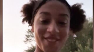 Naomi-Berlin peeing outdoor