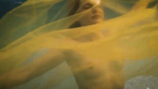 Eila Adams underwater topless