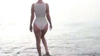 Lada in transparent swimsuit