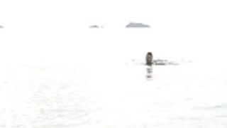 Lada in transparent swimsuit