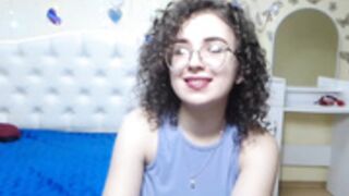 Scammer flashes her boobs.