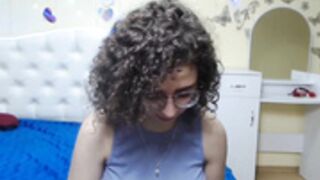 Scammer flashes her boobs.