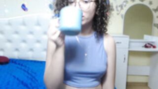 Scammer flashes her boobs.